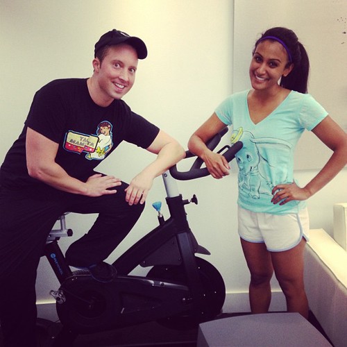 Nina Davuluri with trainer Johnny Triquet of Fly Wheel Sports